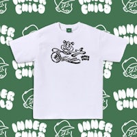 a white t - shirt with an image of a bear riding a bike